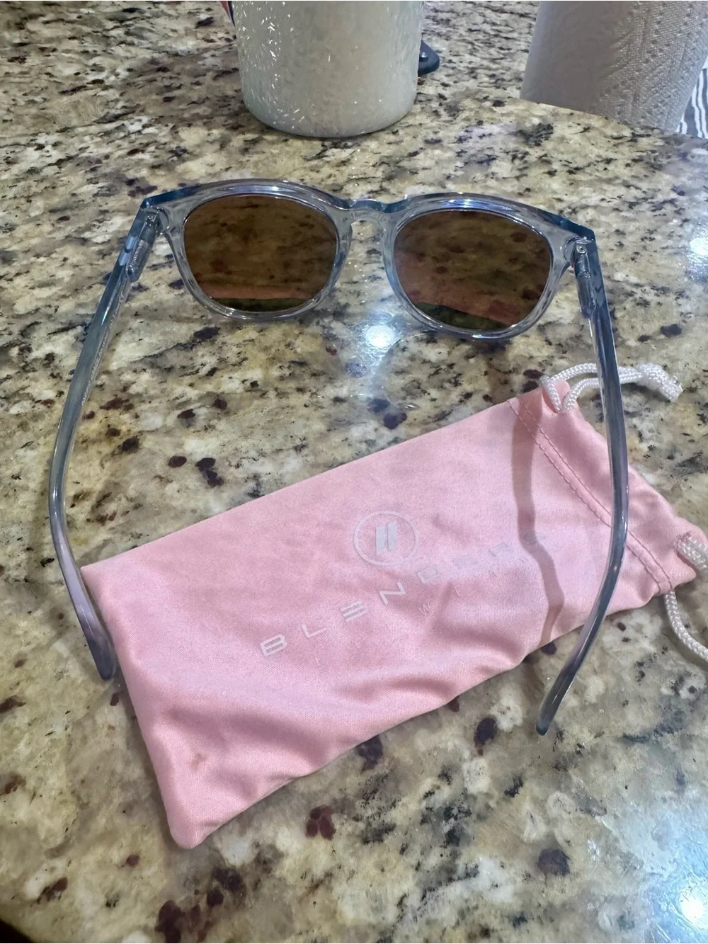 Blenders Blue Clear Frame Sunglasses with Pink Mirrored Lenses